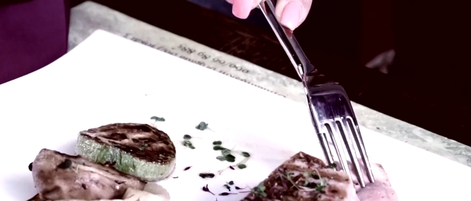 REZBOD one-handed eating utensil in eating configuration
